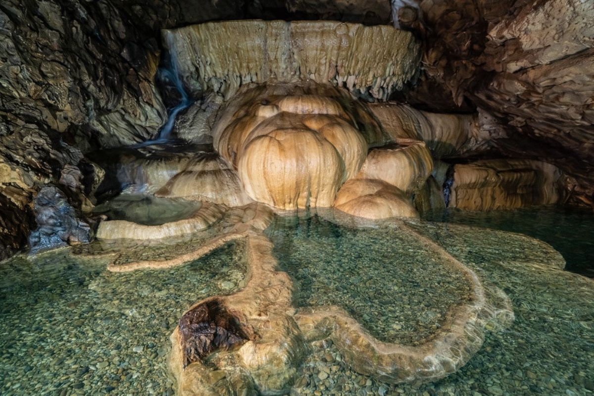 Nam Tan Cave stalactites lotus shapes